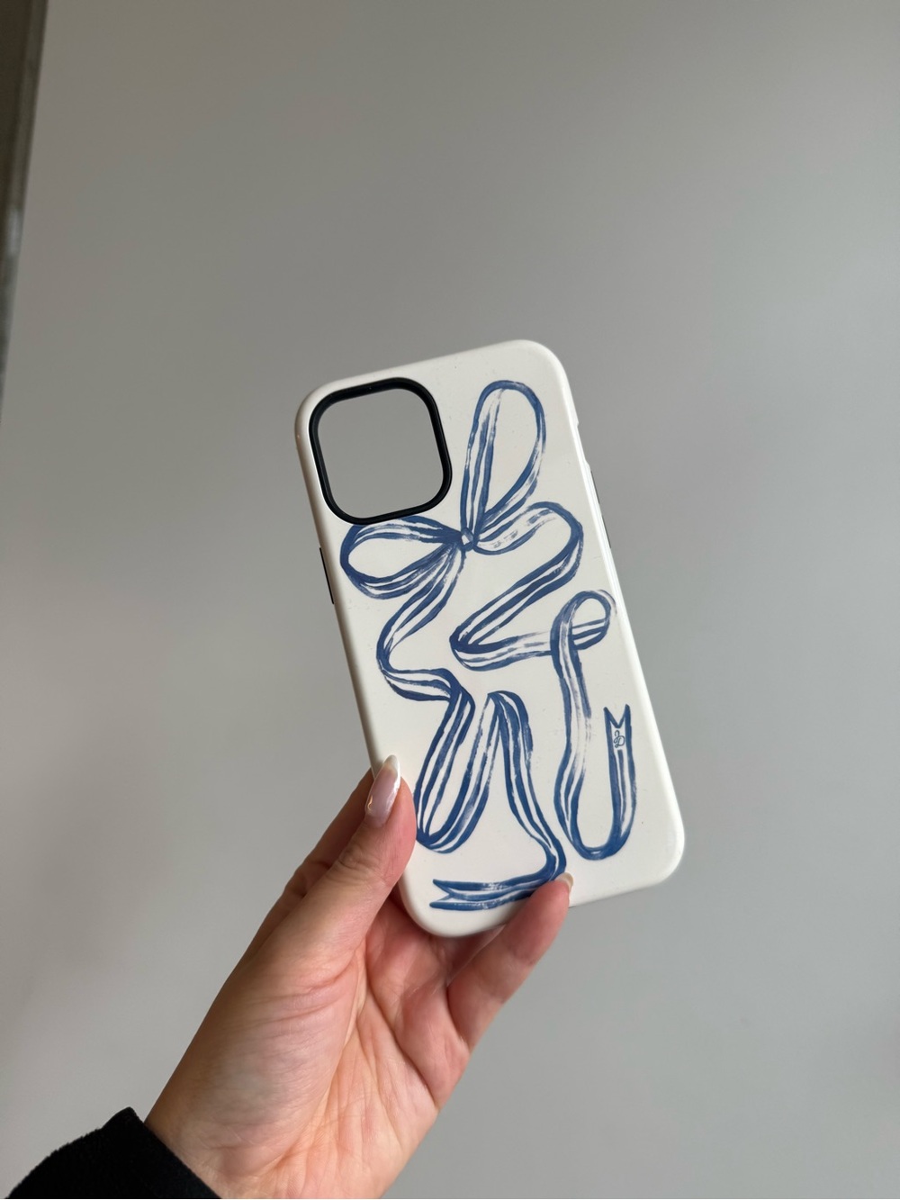 Dairy Boy 12 Pro Max White Phone Case with Blue Ribbon Art